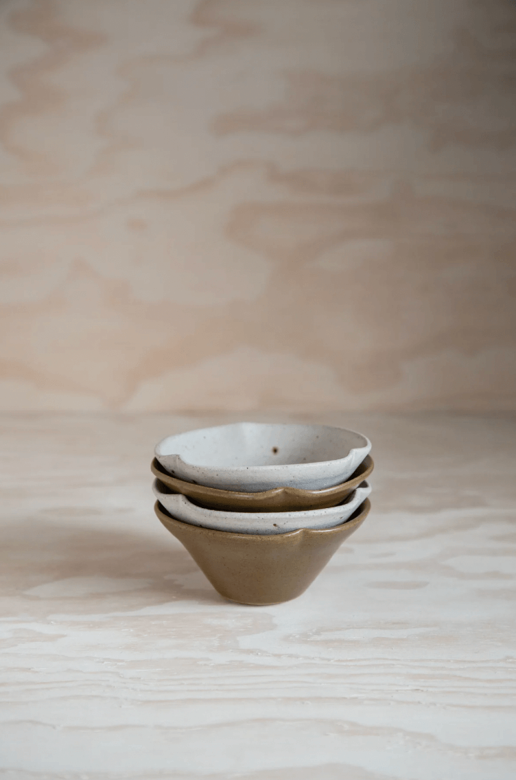 Stack of 4 small petal bowls by ceramicist Charlie Maw