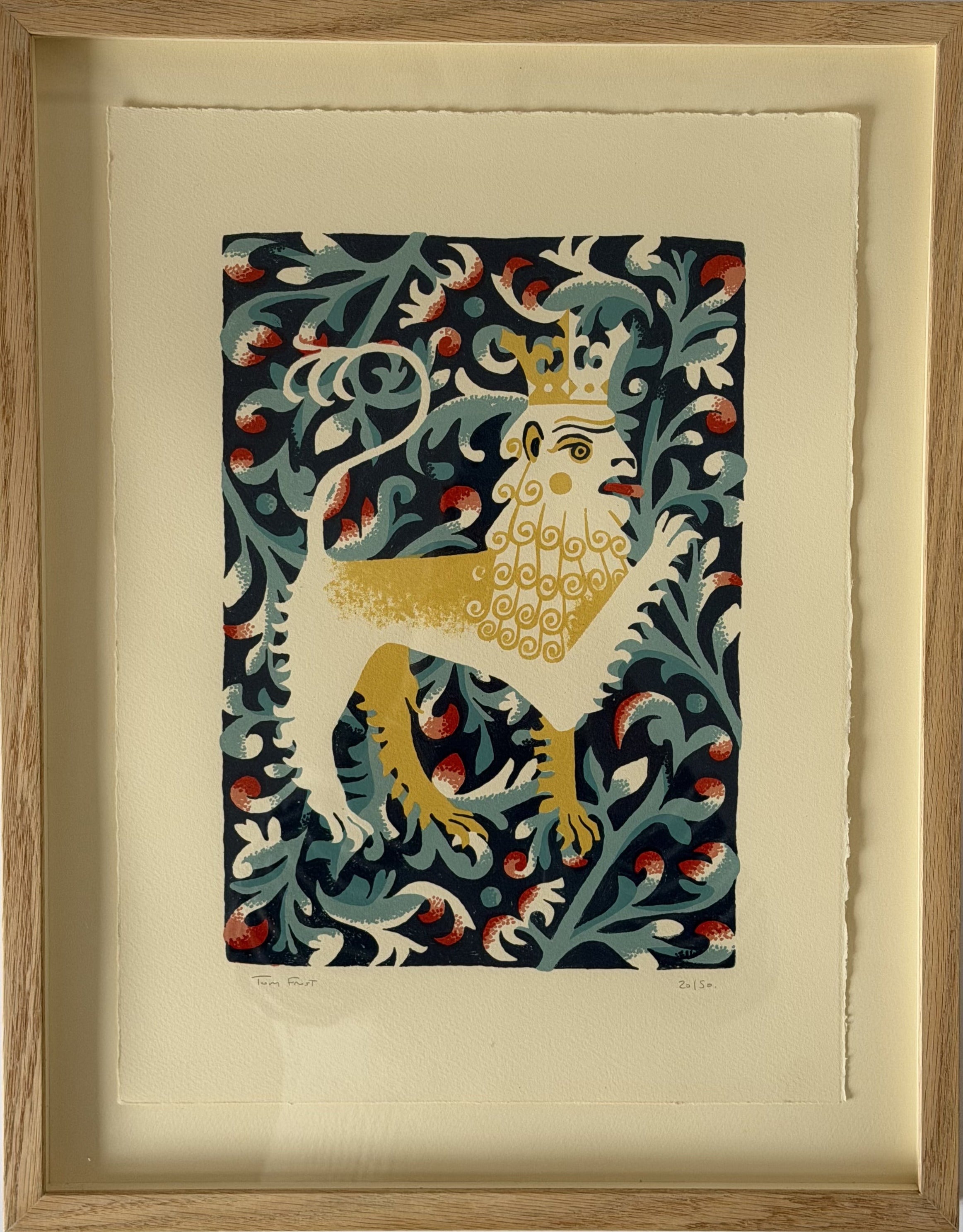 Lion by Tom Frost. Decorative print of a lion with a crown on a blue floral background.