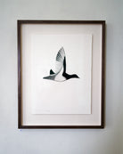 Framed artwork of a bird in flight on a white background by Beatrice Forshall
