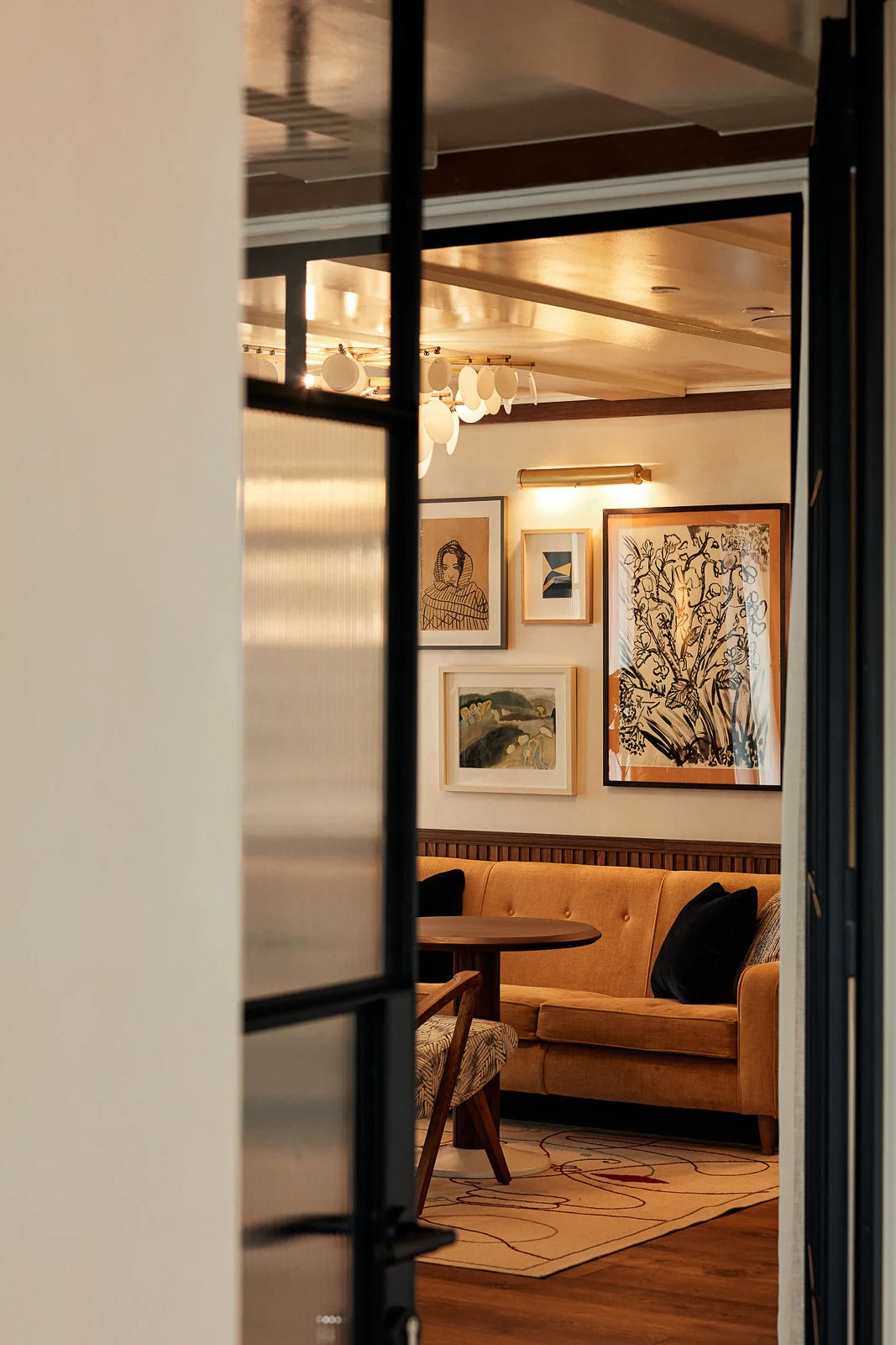 Lounge gallery wall art advisory branded living at The Gessner London