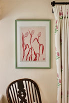 Dancing Tulips I hung on wall by Henny Tate