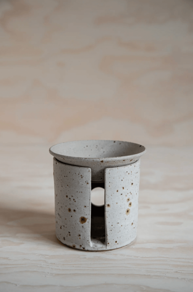Handmade, wheel thrown oil burner by artist Charlie Maw