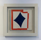 A found paper collage artwork titled 'Star' by Lauri Hopkins, featuring a geometric pattern with red, blue, and beige papers, framed in a light-colored enclosure.