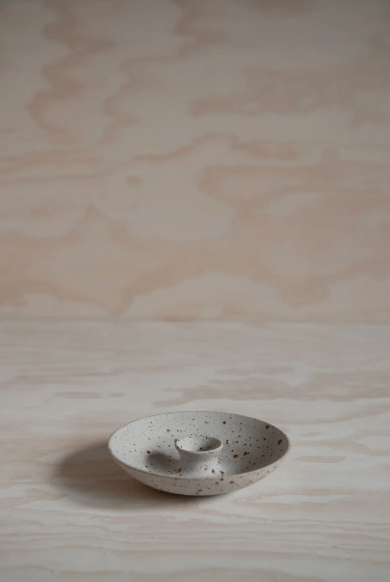 'Swallow' candlestick holder by ceramicist Charlie Maw